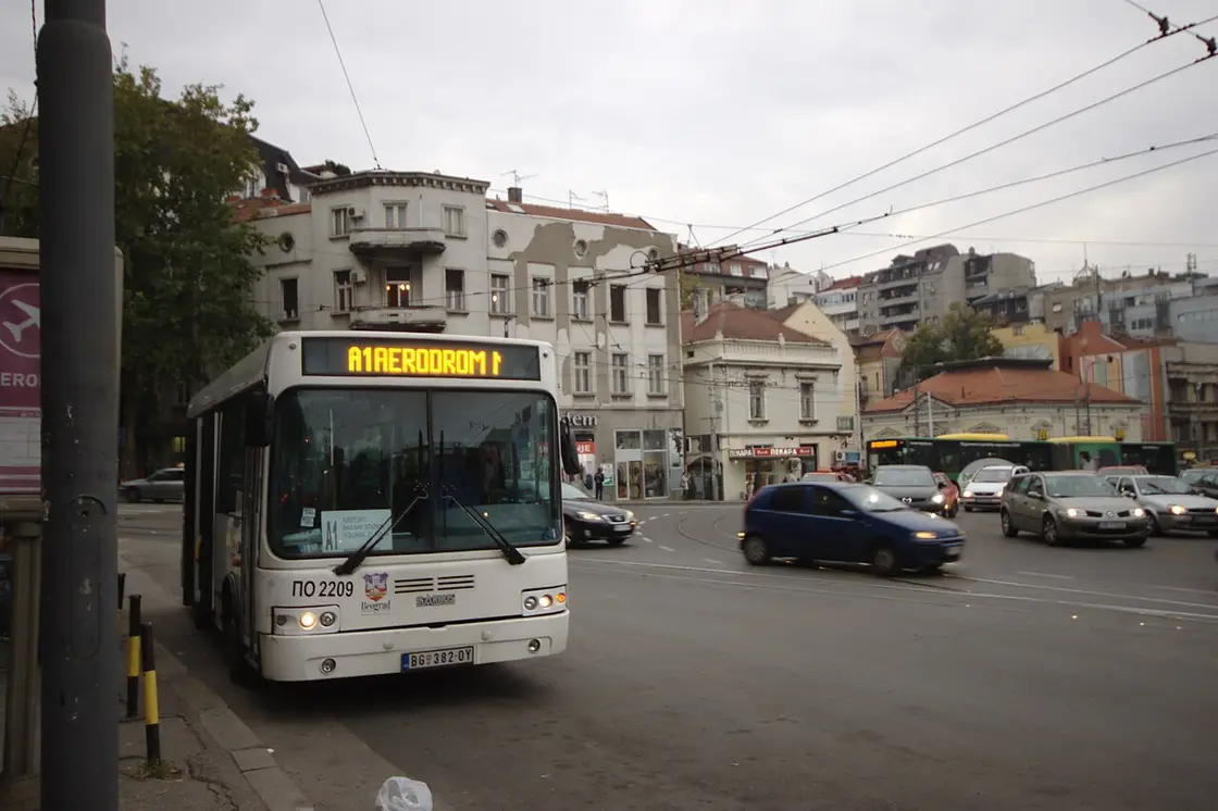 A Belgrade bus with an "A1 Aerodrom" (A1 Airport) destination display on a city street