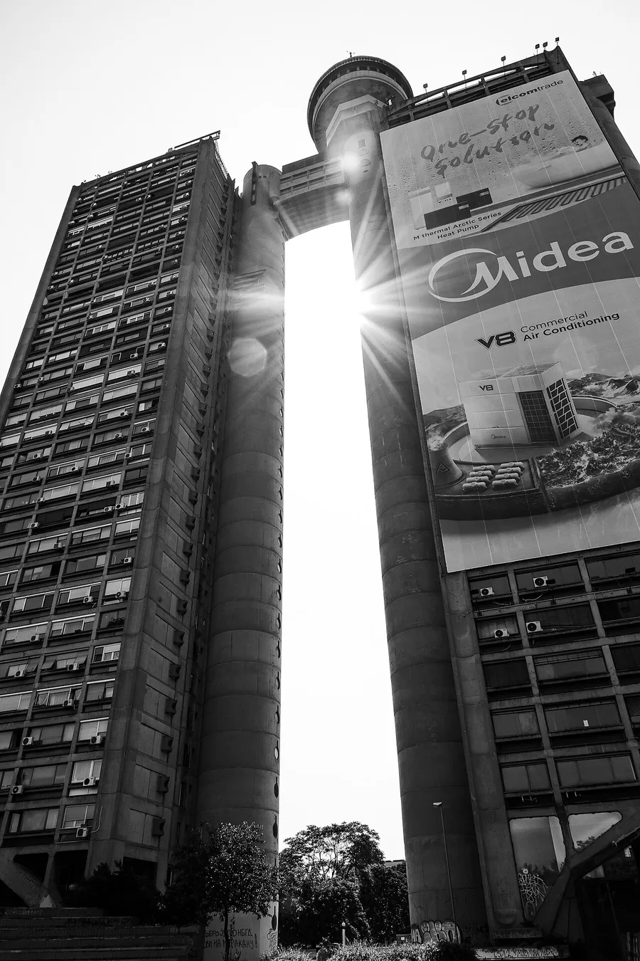 The twin brutalist towers of the Genex Tower joined by a bridge in New Belgrade