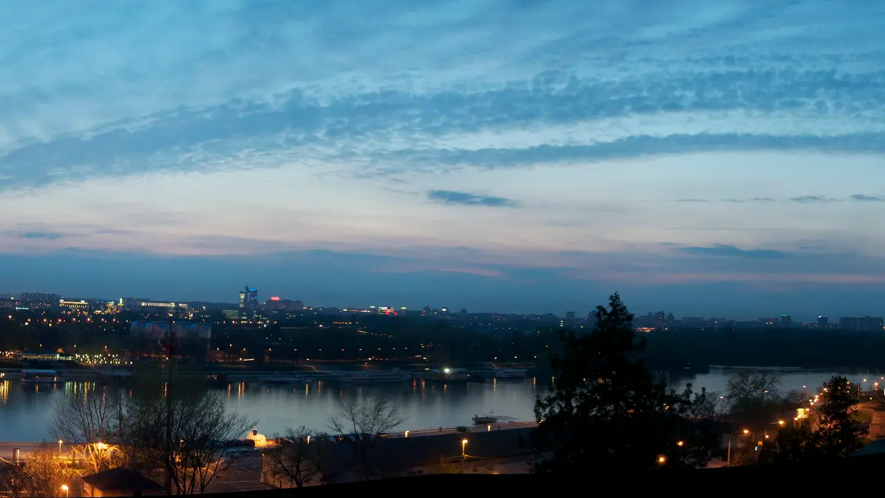 Belgrade lit up at night, seen from Kalemegdan fortress over the Sava and Danube rivers and New Belgrade
