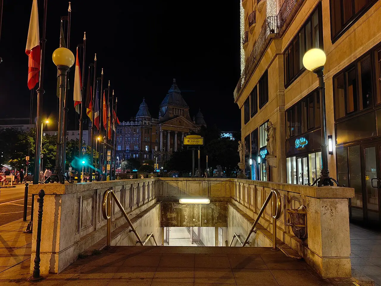 The entrance to the M1 metro line at Deak Ferenc ter in Budapest, lit up at night
