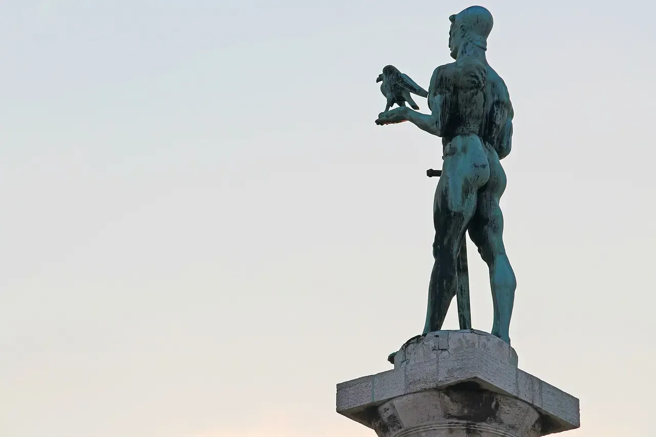 The Victor statue on its column at Kalemegdan with the rivers and New Belgrade beyond