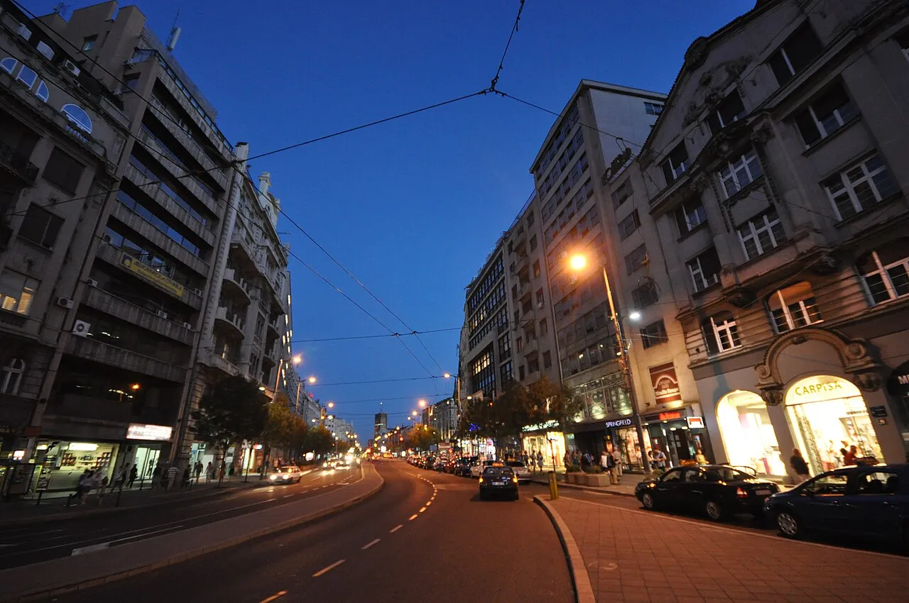 Terazije, one of Belgrade central boulevards, lit up at dusk with trams and shopfronts