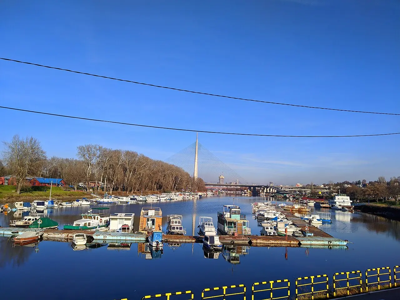 Boats and floating venues along the Belgrade waterfront where city sightseeing cruises depart