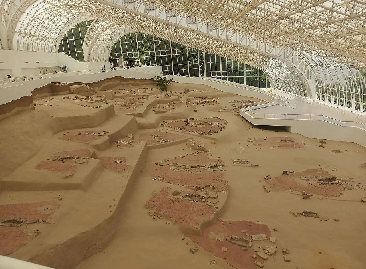 The excavated village of Lepenski Vir laid out under the curved glass roof of its museum hall