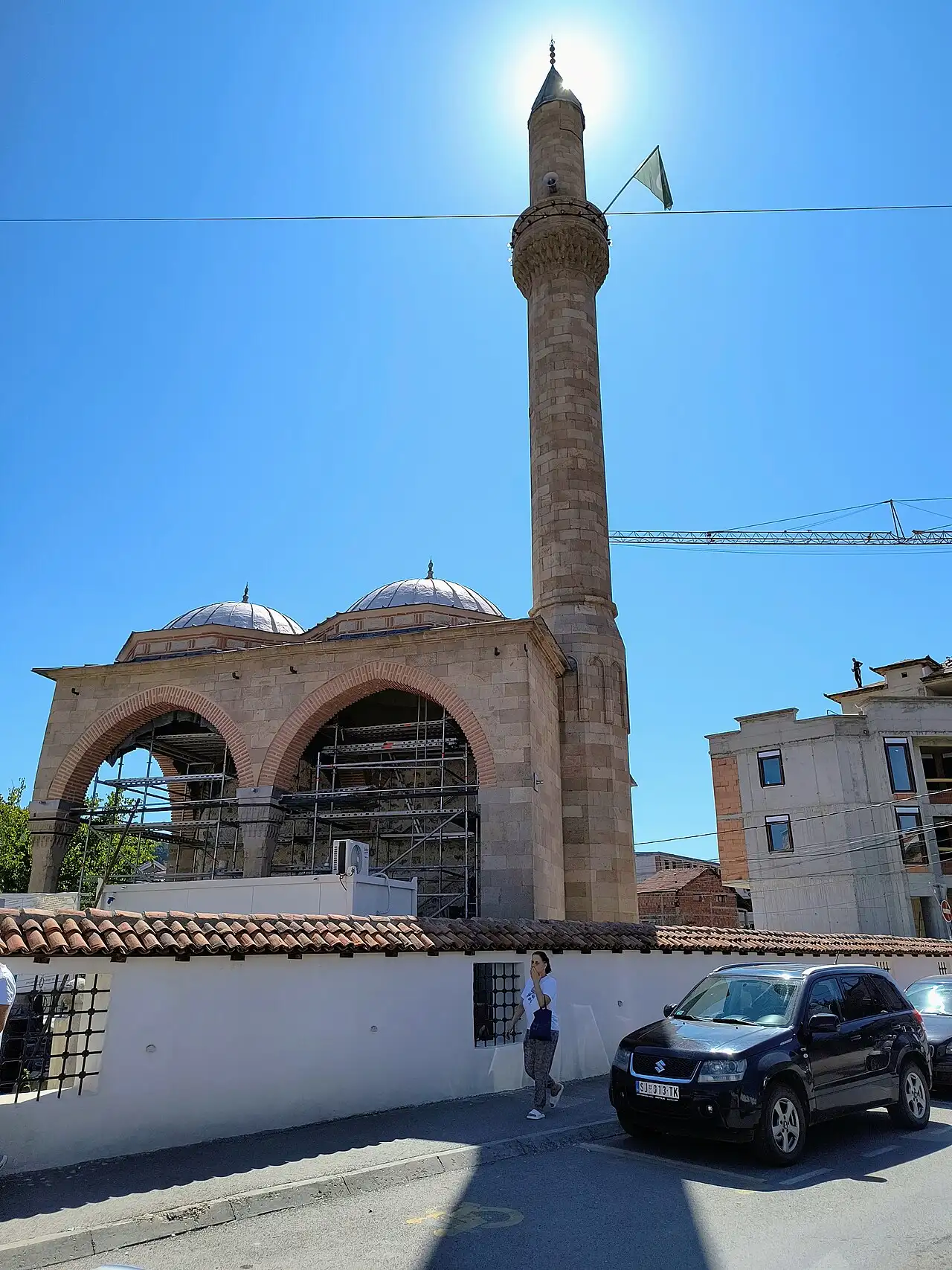 The stone facade and minaret of the 16th-century Altun-alem mosque in Novi Pazar