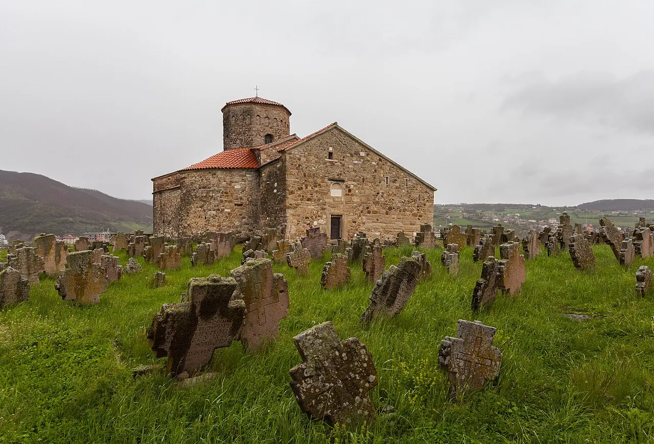 The round stone Church of St Peter above Novi Pazar with its cemetery around it