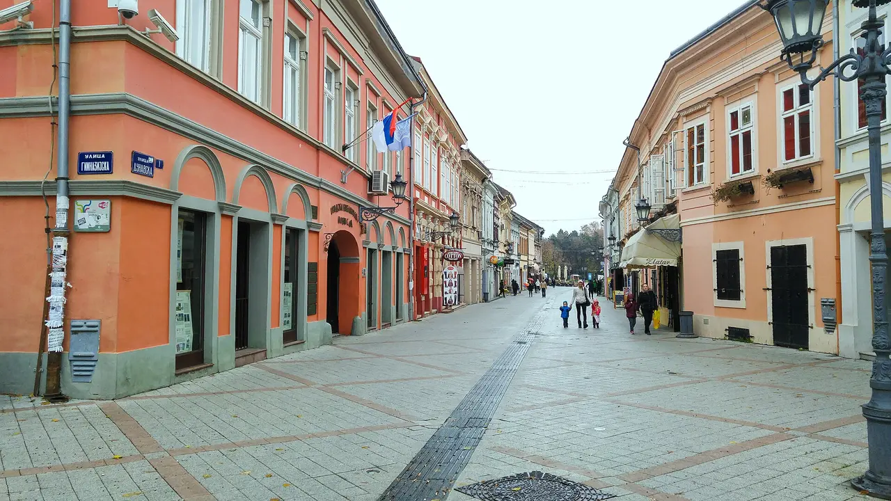 Dunavska Street in Novi Sad, a narrow old street of low colourful buildings leading toward the Danube park