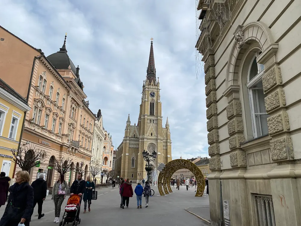 The neo-Gothic Name of Mary Church in Novi Sad with its tall spire rising over the square