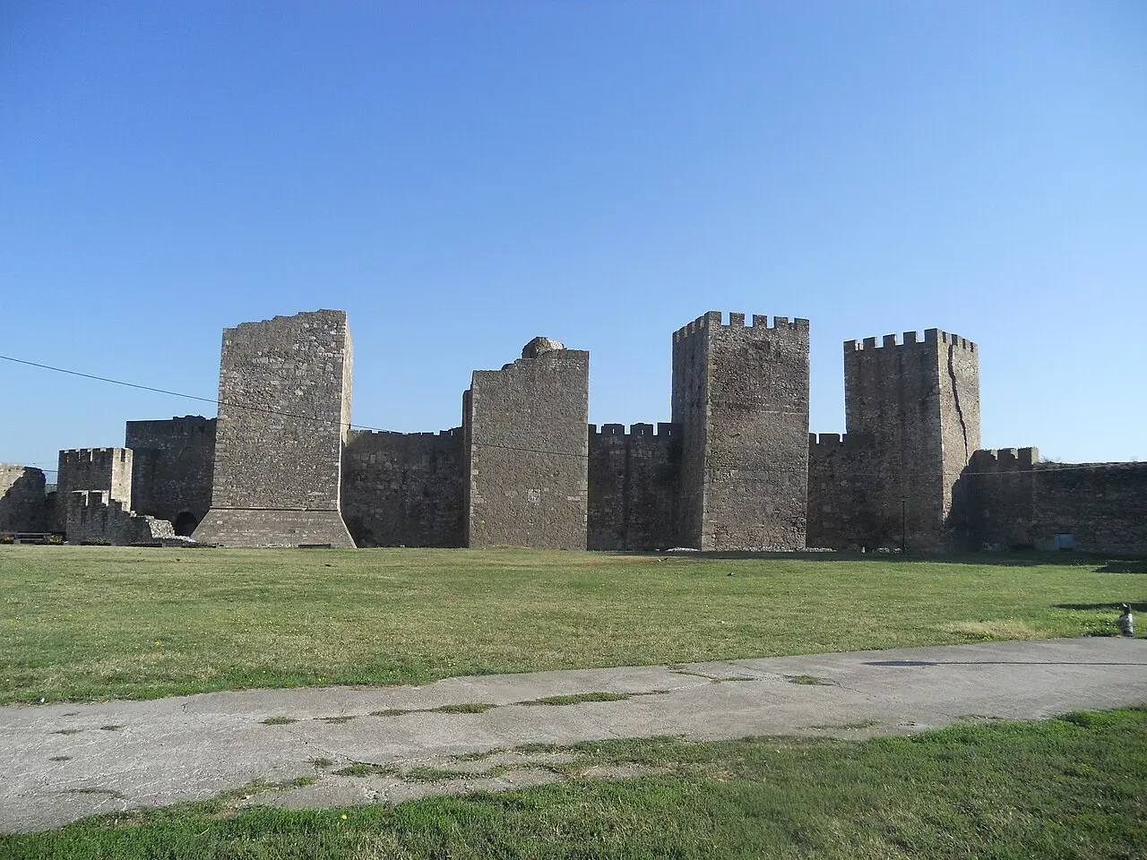 The inner court of Smederevo Fortress with brick walls, arched windows and crenellated towers