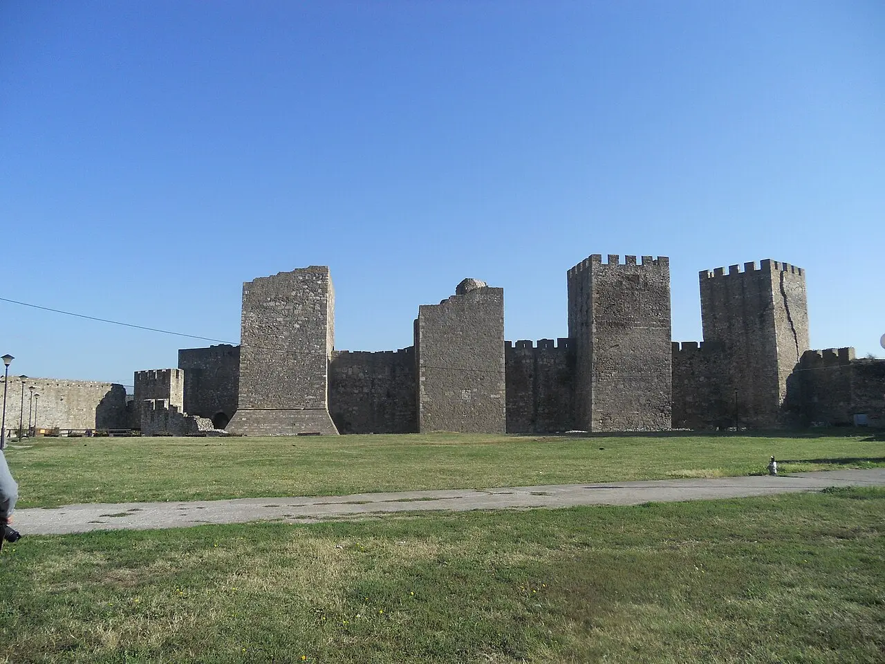 The water-filled moat and outer approach path leading to the walls of Smederevo Fortress