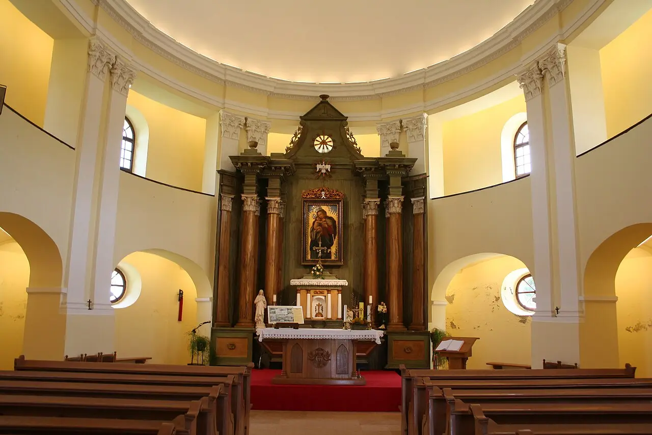 The circular interior of the Chapel of Peace in Sremski Karlovci with its altar and curving wall