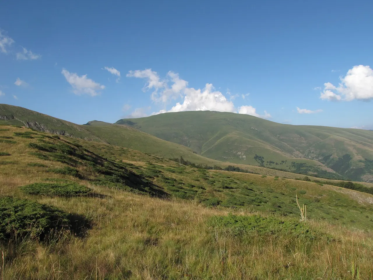 The broad grassy summit ridge of Midžor, the highest point in mainland Serbia, on the Stara Planina plateau