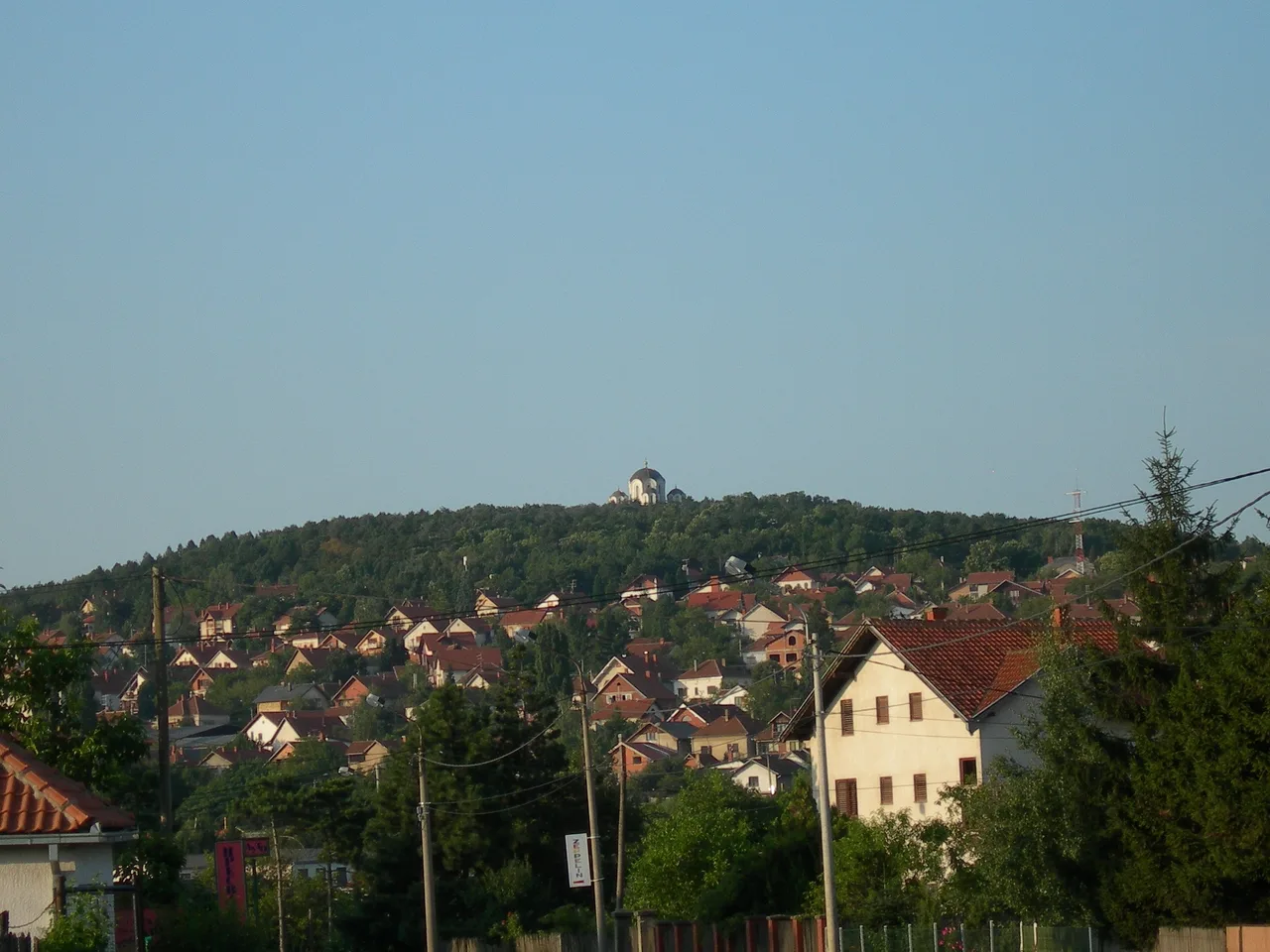 The town of Topola with the white domes of the Oplenac church visible on the hilltop above it