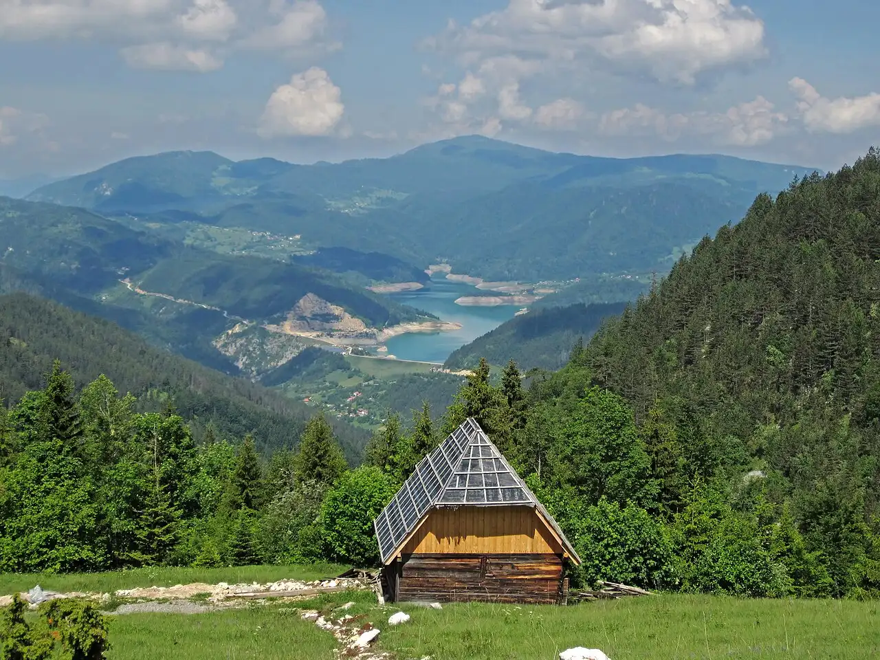 Lake Zaovine ringed by forested hills high on the Tara plateau