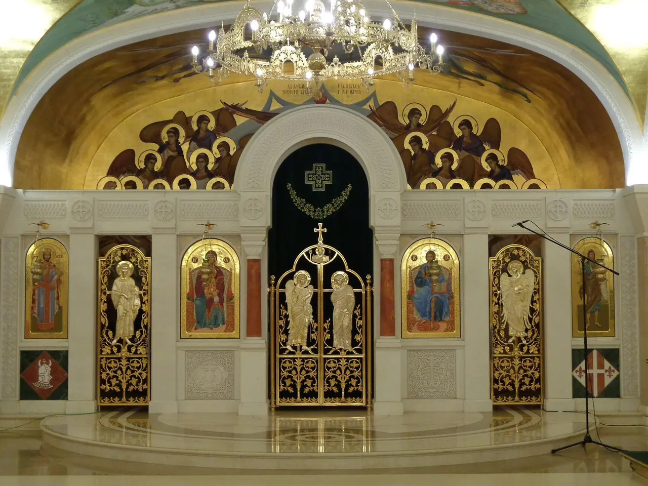 The gilded iconostasis and painted vaults of the crypt church beneath the Temple of Saint Sava
