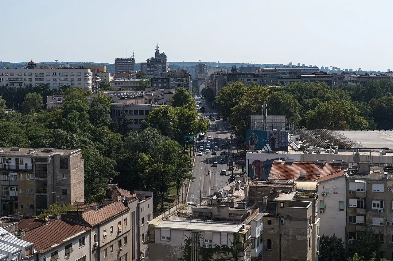 View over central Belgrade rooftops toward the New Belgrade skyline, the start of the Timok loop