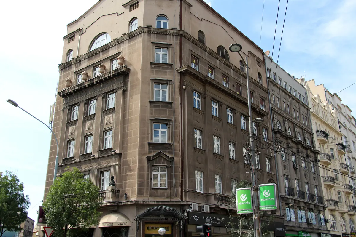 The historic facade of Hotel Balkan on a central Belgrade street corner