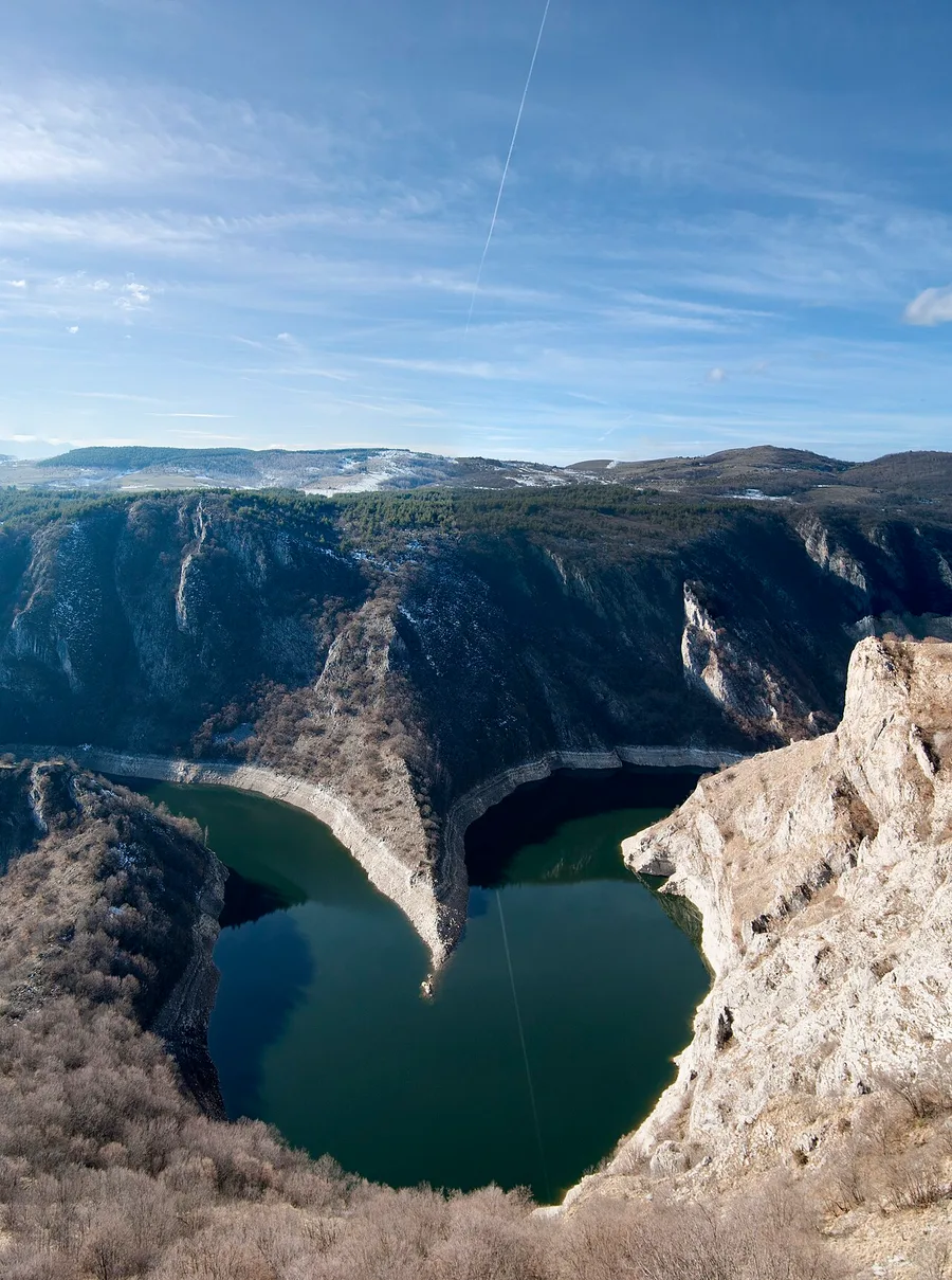 A sharp entrenched meander of the Uvac with turquoise-green water and white limestone cliffs