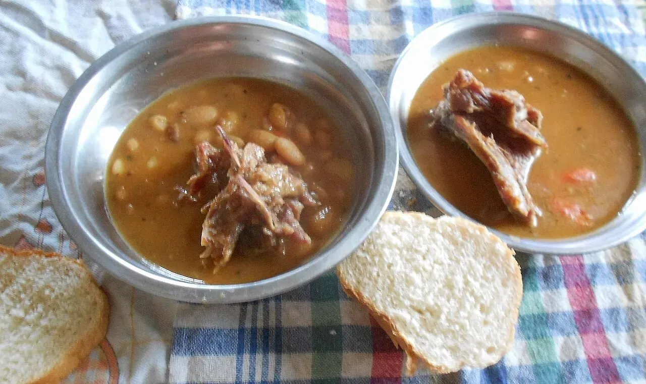 A bowl of Serbian beans in a paprika sauce