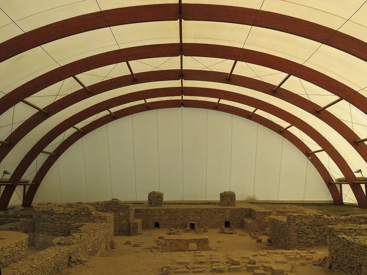 Brick arches and heated-floor channels inside the Roman thermae at Viminacium