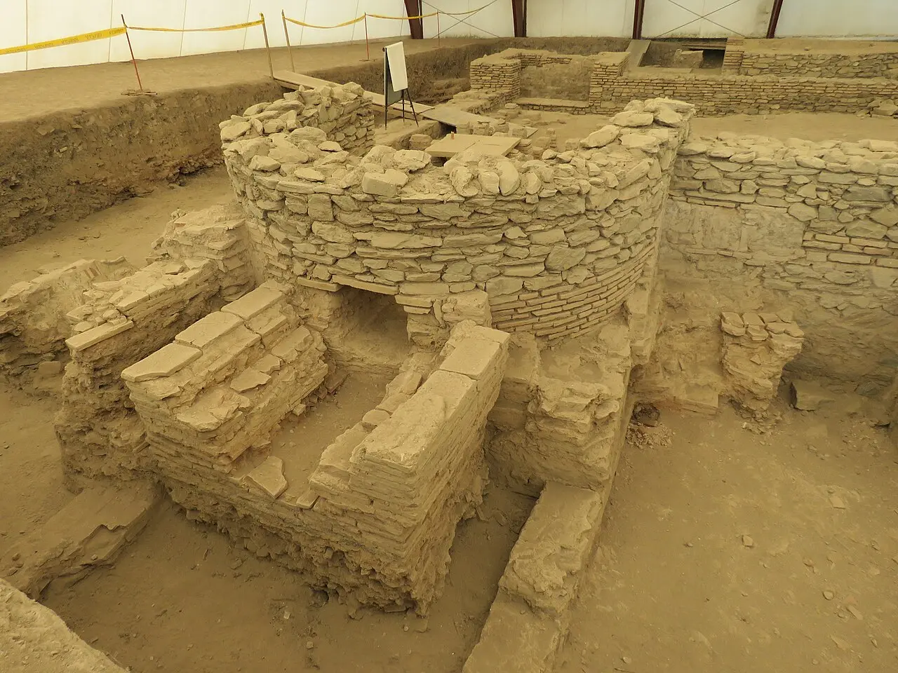 Excavated Roman bath complex at Viminacium with brick hypocaust remains under a protective roof