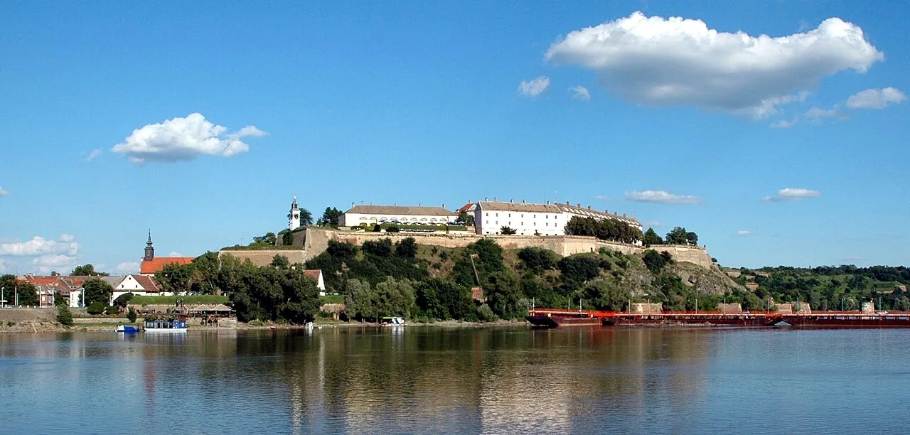 Petrovaradin Fortress on the cliff above the Danube at Novi Sad, seen from the far bank