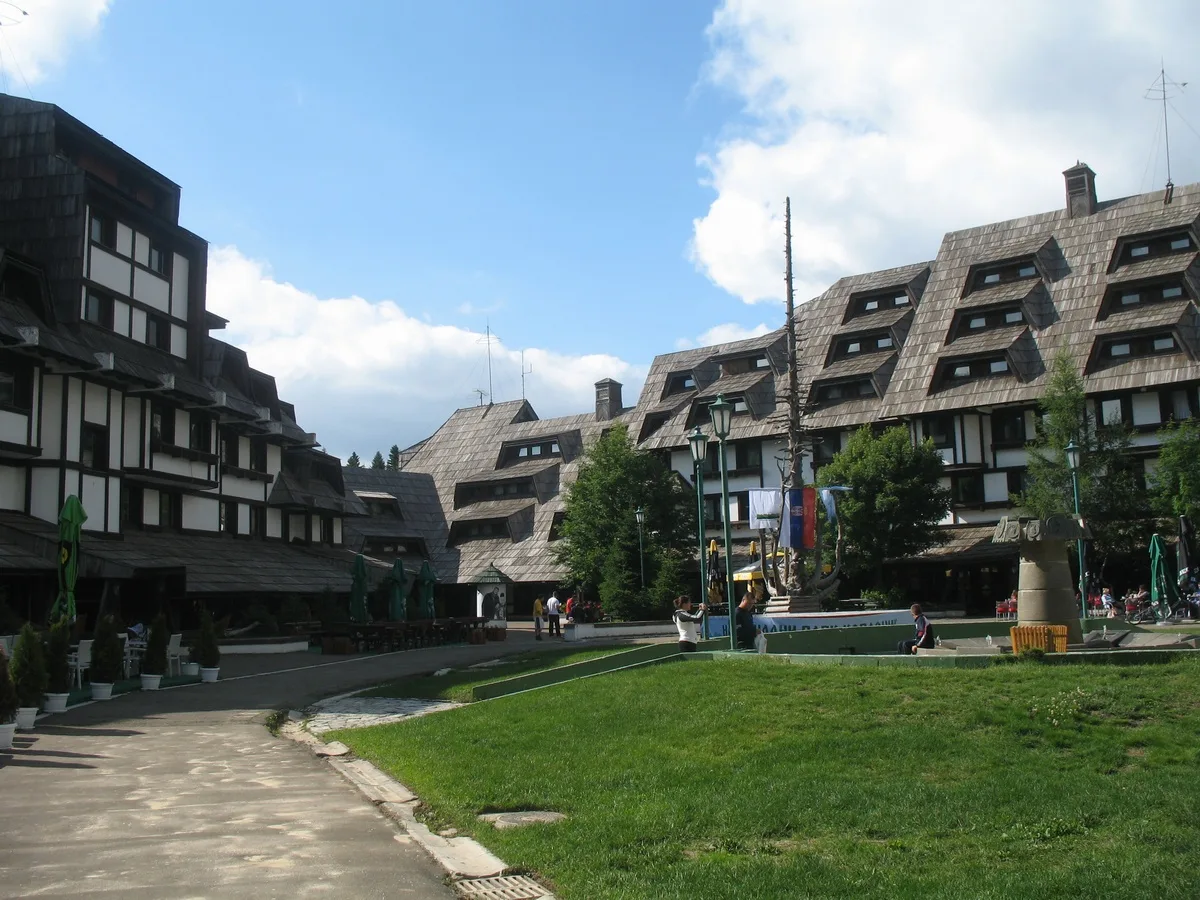 The pedestrian square between the shingled apartment blocks of the Konaci complex on Kopaonik