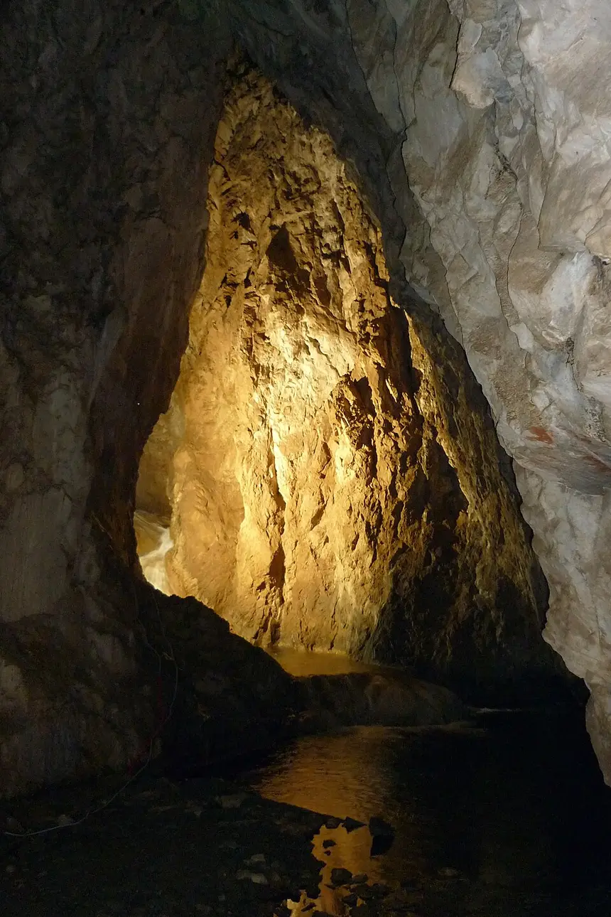 Terraced tufa pools and flowing water inside Stopića Cave near Zlatibor